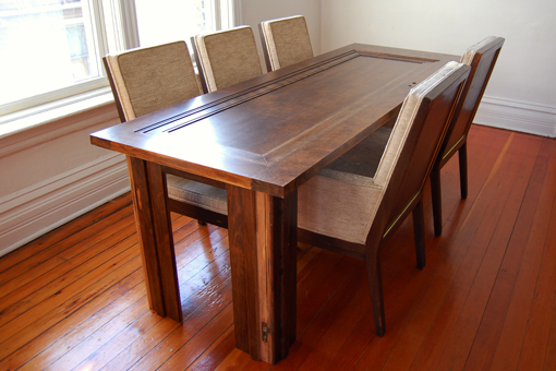 Legs of the table are sections of its former door jamb.